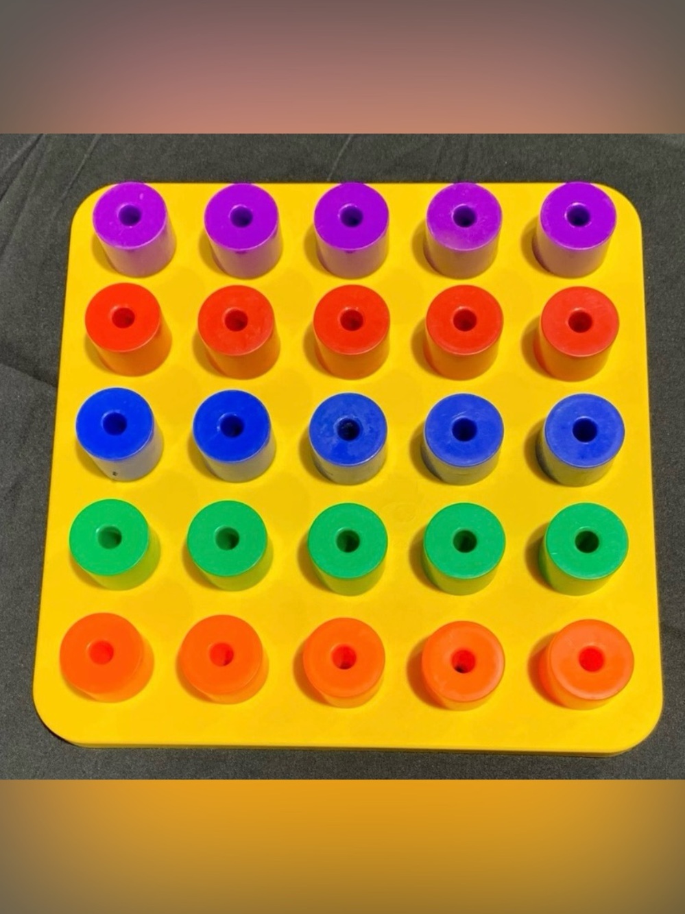Vintage 1983 Discovery Toys Giant Pegboard set, a classic educational toy